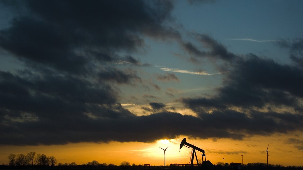 Oil pumpjack at sunset